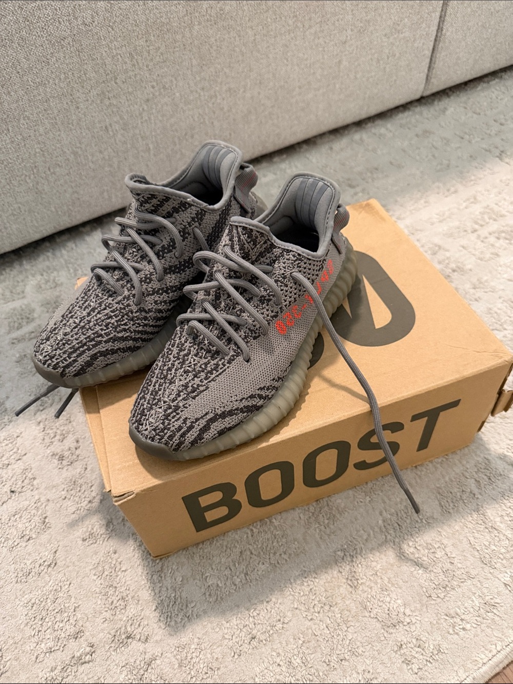 Yeezy Grey Sneaker with Orange Accent